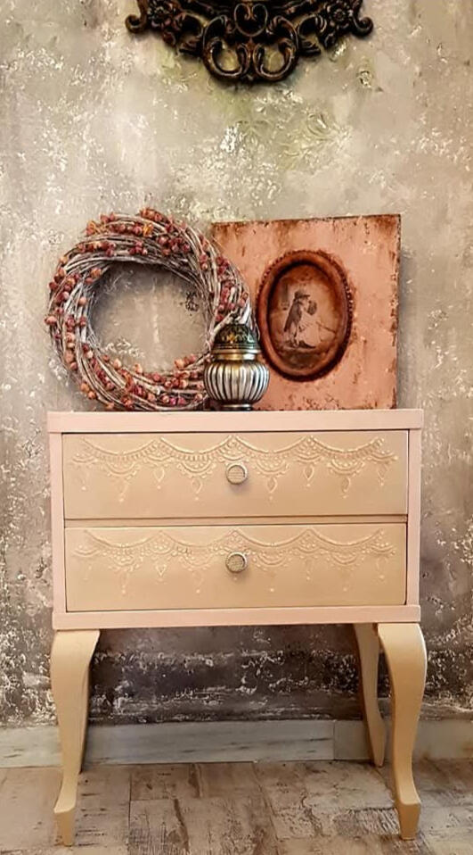 A restored vintage cabinet blending classic craftsmanship with soft contemporary tones. Carefully refinished to preserve its original character while adding warmth, elegance, and timeless decorative presence.
